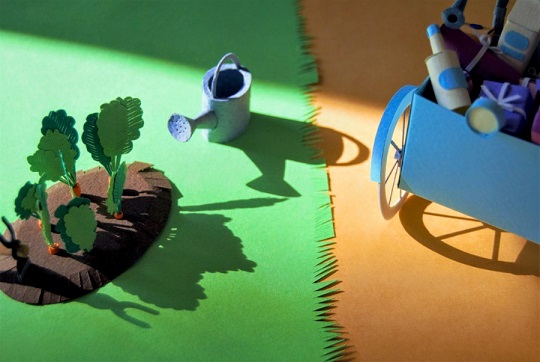 Paper art - Detail. Watering can, carrot patch and tricycle wheel. Miniatures.