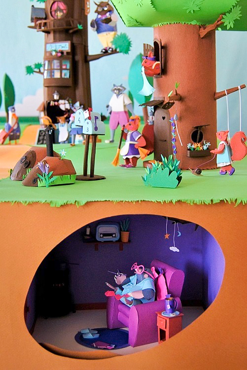 Paper art - Cross section of the diorama. The mole in her burrow and the squirrels tree outside.