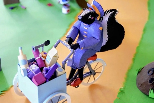 Paper art - The grocery delivery skunk on her tricycle full of packages. Paper model.