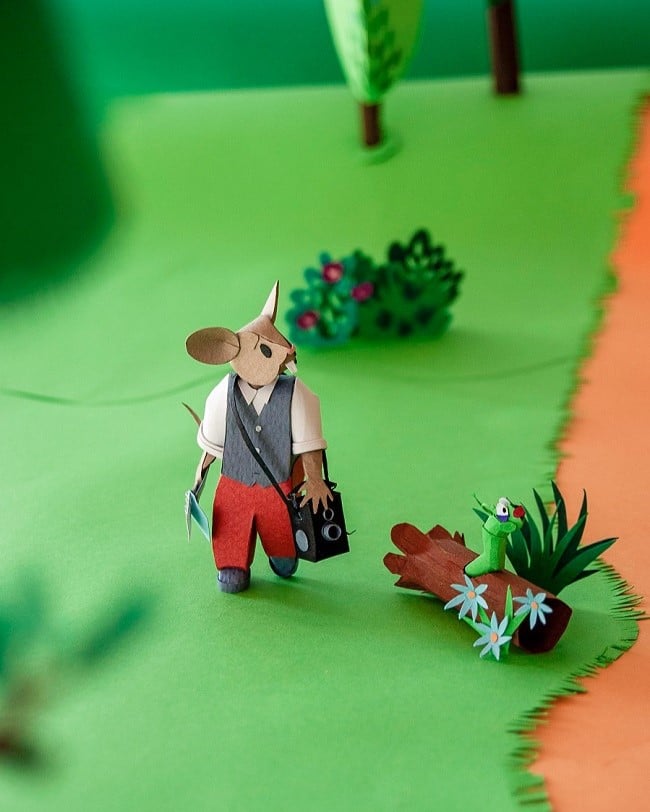 Paper art - Journalist mouse searching for news in the forest. Paper miniatures.