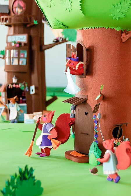 Paper Art - A squirrels family cleaning their house-tree. Paper diorama.